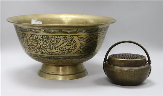 A Chinese bronze handwarmer and a bronze basin, basin 12.5in.